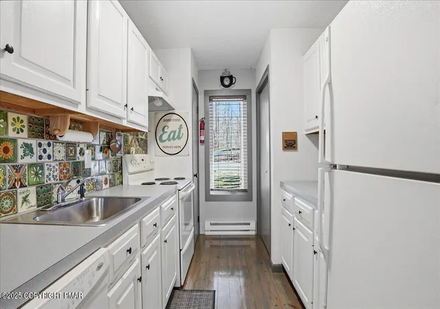 Photo 3 of Townhouse for sale at 119 Downhill, Lake Harmony, PA 18624 | MLS# PM-137066 | Listing updated on 2026-08-02