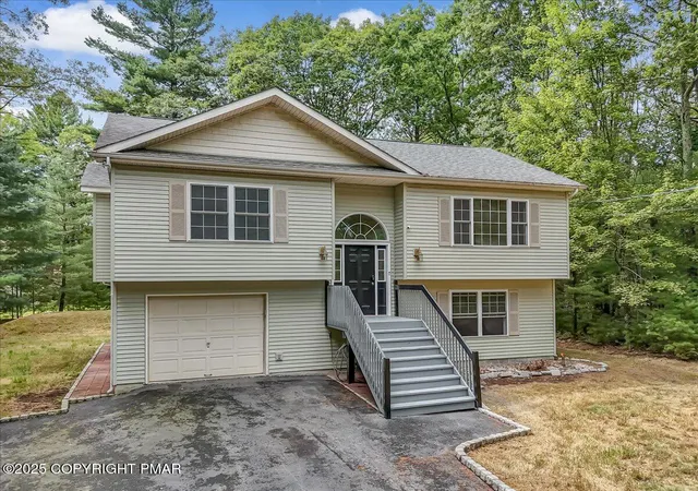Photo 1 of Single Family Residence at 107 Lake Forest Dr, Dingmans Ferry, PA 18328 | MLS# PM-137049 |  | Sold on 2026-01-07