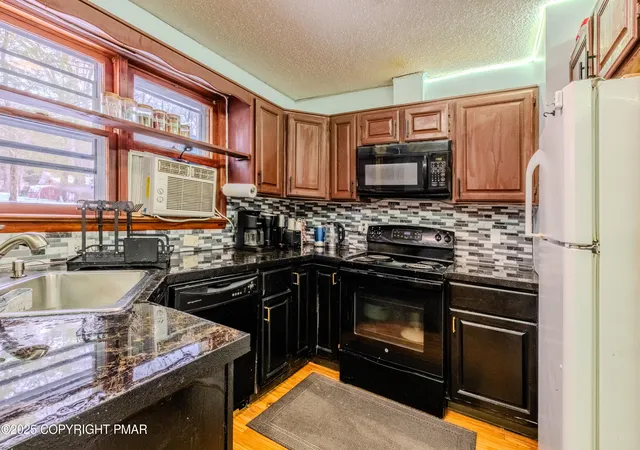 Photo 4 of Single family home for sale at 1731 Lake Ln, Pocono Lake, PA 18347 | MLS# PM-137820 | Listing updated on 2026-06-12