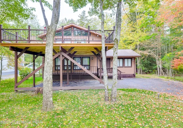 Photo 2 of Single family home for sale at 353 Scotch Pine Dr, Pocono Summit, PA 18346 | MLS# PM-138205 | Listing updated on 2026-04-03