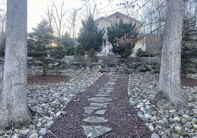 Photo 2 of Single family home for sale at 7004 Woodbridge Dr W, Bushkill, PA 18324 | MLS# PM-138240 | Listing updated on 2026-03-15