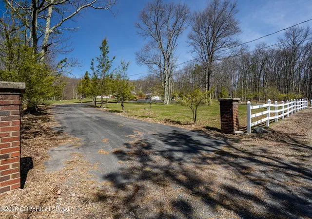 Photo 2 of Single family home for sale at 148 Sportsmans Trl, Stroudsburg, PA 18360 | MLS# PM-138610 | Listing updated on 2026-08-10