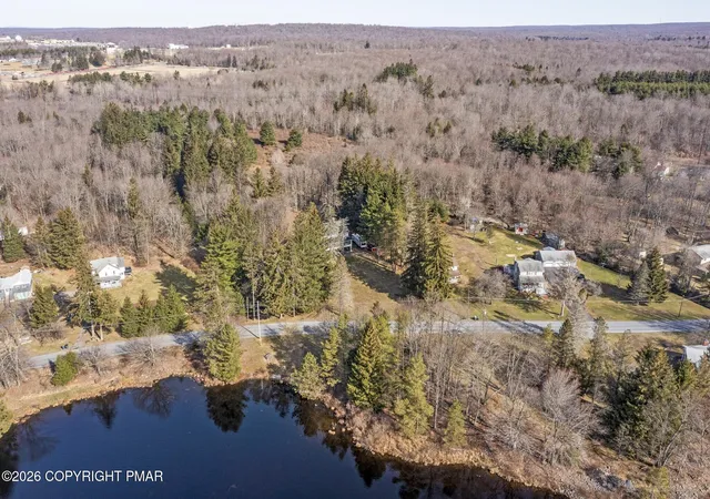 Photo 2 of Single family home for sale at 2101 Lakeside Dr, Tobyhanna, PA 18466 | MLS# PM-139371 | Listing updated on 2026-03-11