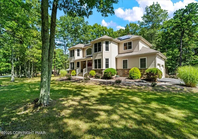 Photo 2 of Single Family Residence at 512 Bombur Ln, Tamiment, PA 18371 | MLS# PM-139460 | | Sold on 2026-05-08