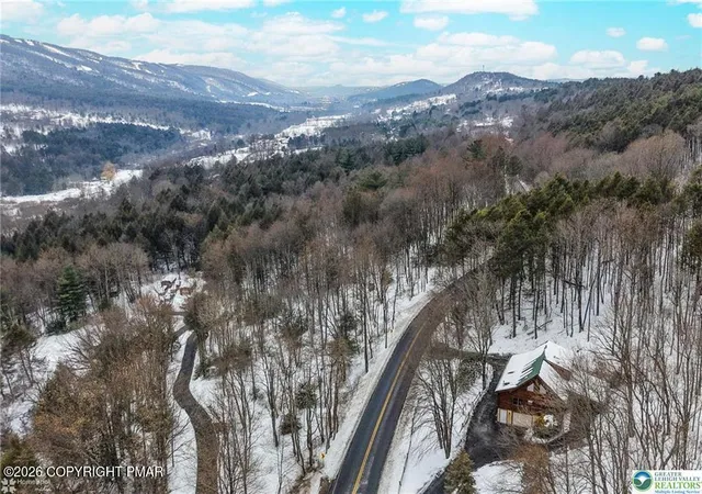 Photo 4 of Single Family Residence at 1153 Lower Smith Gap Rd, Kunkletown, PA 18058 | MLS# PM-138916 | | Sold on 2026-03-17