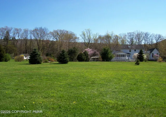 Photo 3 of Single family home for sale at 129 Bald Mountain Rd, Bear Creek Township, PA 18702 | MLS# PM-140000 | Listing updated on 2026-04-02