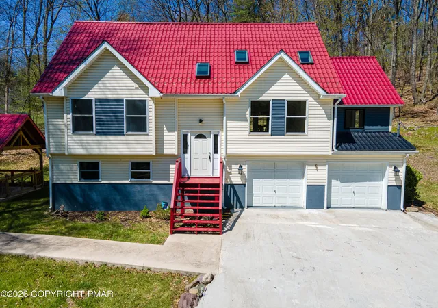 Photo 1 of Single family home for sale at 57 Lake Ln, East Stroudsburg, PA 18301 | MLS# PM-141200 | Listing updated on 2026-06-08
