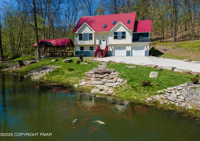 Photo 2 of Single family home for sale at 57 Lake Ln, East Stroudsburg, PA 18301 | MLS# PM-141200 | Listing updated on 2026-06-08