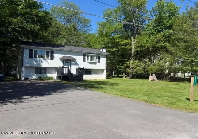 Photo 1 of Single family home for sale at 8111 Coco Dr, Pocono Summit, PA 18346 | MLS# PM-141362 | Listing updated on 2026-08-20