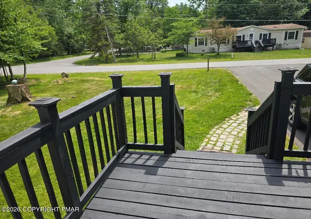Photo 4 of Single family home for sale at 8111 Coco Dr, Pocono Summit, PA 18346 | MLS# PM-141362 | Listing updated on 2026-08-20