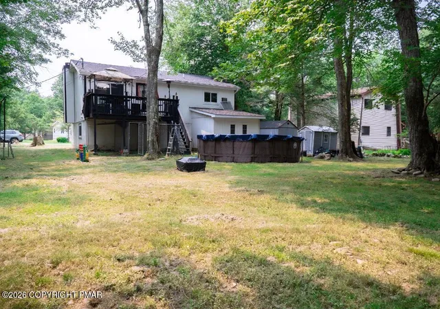 Photo 3 of Single family home for sale at 8111 Coco Dr, Pocono Summit, PA 18346 | MLS# PM-141362 | Listing updated on 2026-08-20