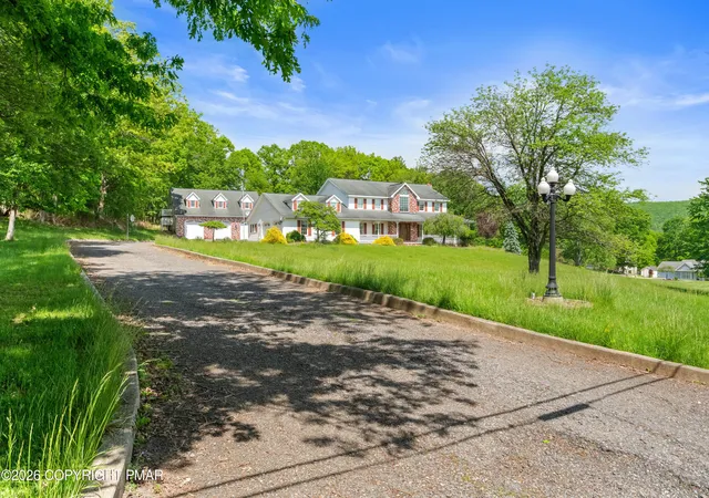 Photo 2 of Single family home for sale at 324 W 10th Street, Jim Thorpe, PA 18229 | MLS# PM-141745 | Listing updated on 2026-07-21