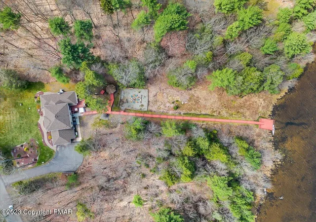 Photo 2 of Single family home for sale at 157 Greenwood Dr, Pocono Lake, PA 18347 | MLS# PM-141961 | Listing updated on 2026-07-14