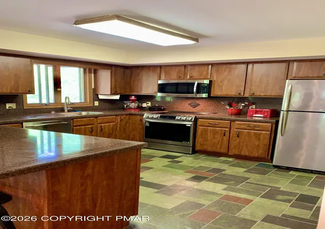 Photo 4 of Single family home for sale at 129 Sawmill Rd, Pocono Lake, PA 18347 | MLS# PM-142166 | Listing updated on 2026-09-06