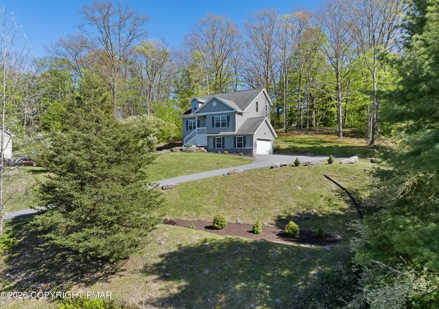 Photo 3 of Single family home for sale at 320 Reagan Dr, East Stroudsburg, PA 18301 | MLS# PM-142233 | Listing updated on 2026-09-06