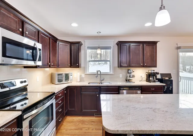Photo 4 of Single family home for sale at 320 Reagan Dr, East Stroudsburg, PA 18301 | MLS# PM-142233 | Listing updated on 2026-09-06
