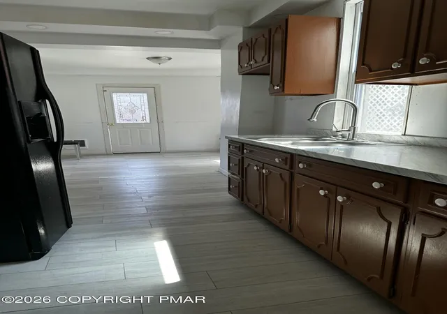 Photo 4 of Sale Pending at 128 E Penn St, Shenandoah, PA 17976 | MLS# PM-142507 | Listing updated on 2026-08-31