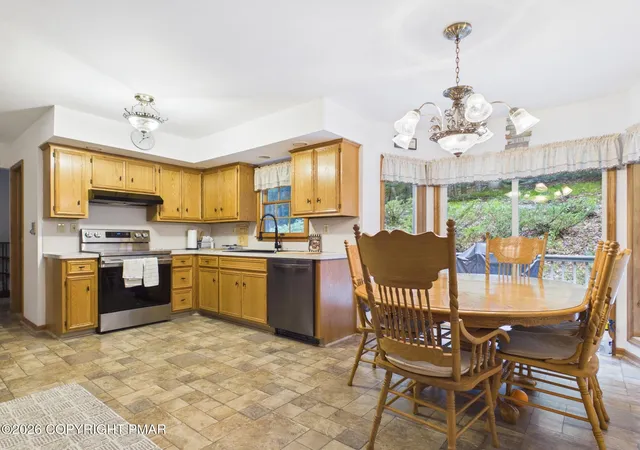 Photo 3 of Single family home for sale at 5390 Woodbridge Dr E, Bushkill, PA 18324 | MLS# PM-142583 | Listing updated on 2026-06-26