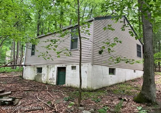 Photo 2 of Single family home for sale at 3302 Pocono Dr, East Stroudsburg, PA 18302 | MLS# PM-143365 | Listing updated on 2026-09-14