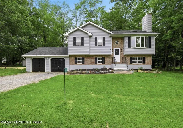 Photo 2 of Single family home for sale at 296 Scotch Pine Dr, Pocono Summit, PA 18346 | MLS# PM-143108 | Listing updated on 2026-08-20