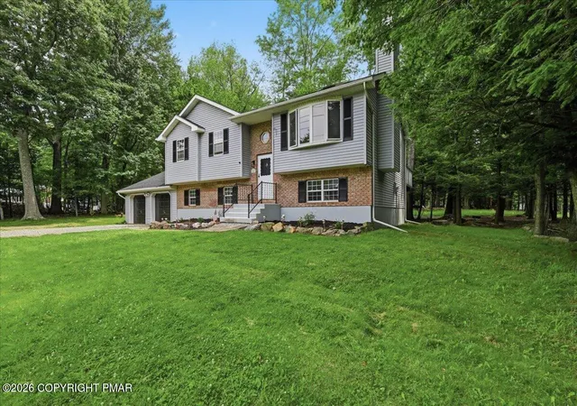 Photo 4 of Single family home for sale at 296 Scotch Pine Dr, Pocono Summit, PA 18346 | MLS# PM-143108 | Listing updated on 2026-08-20