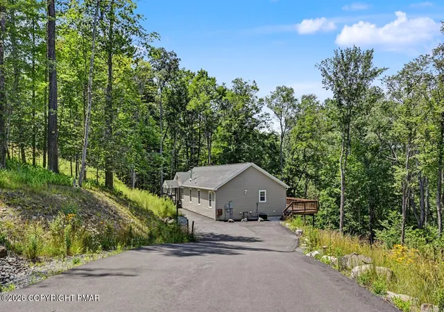 Photo 3 of Single family home for sale at 2016 Locust Ridge Rd, Pocono Lake, PA 18347 | MLS# PM-143174 | Listing updated on 2026-08-26