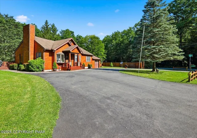 Photo 2 of Single family home for sale at 1100 Blackberry Rd, Pocono Lake, PA 18347 | MLS# PM-143416 | Listing updated on 2026-09-09