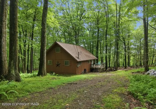 Photo 1 of Single family home for sale at 32 Mountain View Dr, Pocono Lake, PA 18347 | MLS# PM-143649 | Listing updated on 2026-08-05