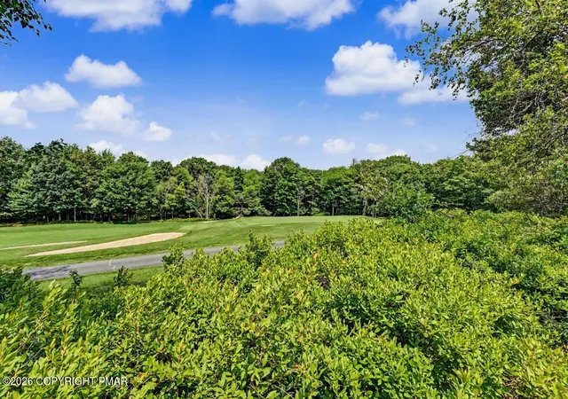 Photo 2 of Single family home for sale at 251 Wild Pines Dr, Pocono Pines, PA 18350 | MLS# PM-143533 | Listing updated on 2026-09-10