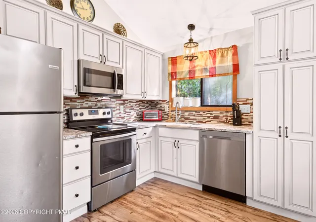 Photo 3 of Single family home for sale at 126 Maxatawny Dr, Pocono Lake, PA 18347 | MLS# PM-143293 | Listing updated on 2026-09-02