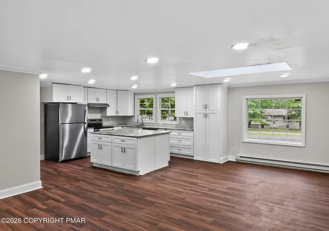 Photo 4 of Single family home for sale at 229 Pocono Blvd, Bushkill, PA 18324 | MLS# PM-143329 | Listing updated on 2026-09-30