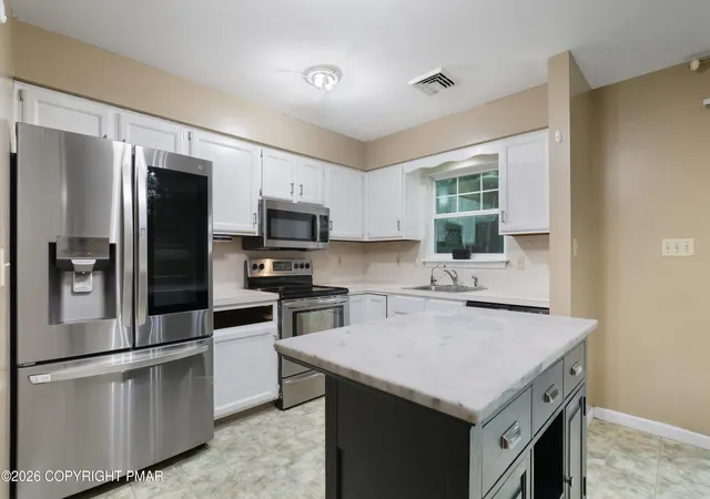 Photo 4 of Single family home for sale at 2210 S Rocky Mountain Dr, Effort, PA 18330 | MLS# PM-143478 | Listing updated on 2026-09-01