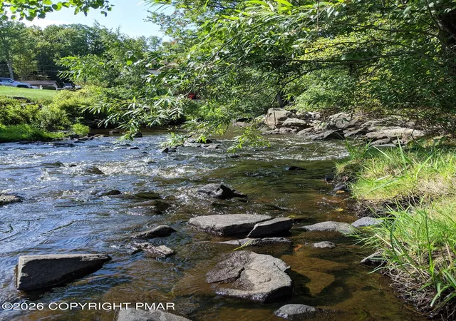 Photo 5 of Land for sale at Old Lake Shore Dr, Pocono Lake, PA 18347 | MLS# PM-143493 | Listing updated on 2026-07-30