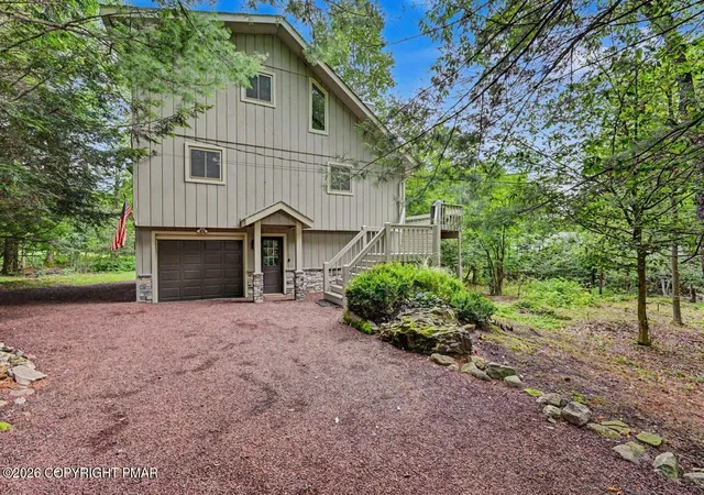 Photo 2 of Single family home for sale at 1233 Clear Pond Rd, Pocono Pines, PA 18350 | MLS# PM-143547 | Listing updated on 2026-08-05