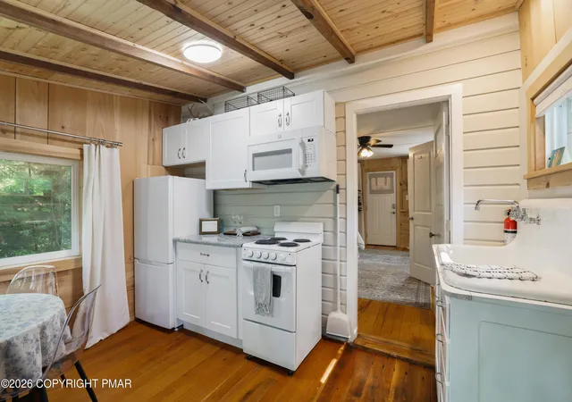 Photo 3 of Single family home for sale at 221 John St, Pocono Pines, PA 18350 | MLS# PM-143792 | Listing updated on 2026-08-13