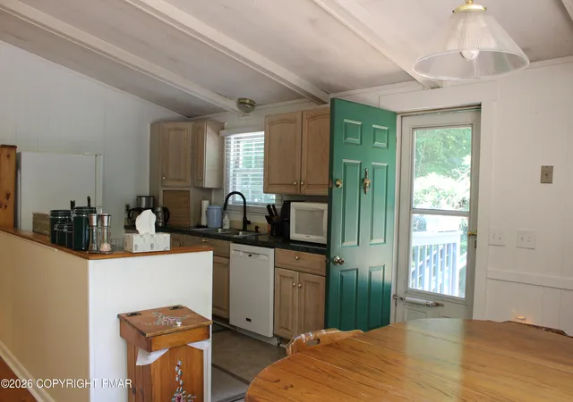 Photo 5 of Single family home for sale at 1115 Falls Rd, Bushkill, PA 18324 | MLS# PM-143801 | Listing updated on 2026-08-29