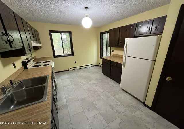 Photo 3 of Sale Pending at 68 Recreation Dr, Jim Thorpe, PA 18229 | MLS# PM-143870 | Listing updated on 2026-10-08