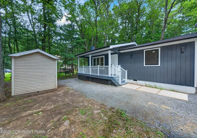 Photo 3 of Single family home for sale at 3124 Leisure Dr, Pocono Summit, PA 18346 | MLS# PM-143875 | Listing updated on 2026-09-25