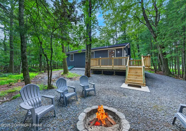 Photo 3 of Single family home for sale at 3124 Leisure Dr, Pocono Summit, PA 18346 | MLS# PM-143875 | Listing updated on 2026-09-25