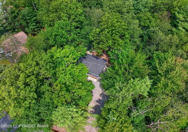 Photo 4 of Single family home for sale at 3124 Leisure Dr, Pocono Summit, PA 18346 | MLS# PM-143875 | Listing updated on 2026-09-25