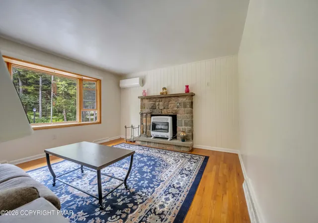 Photo 3 of Single family home for sale at 6469 Laurel Rd, Pocono Summit, PA 18346 | MLS# PM-143944 | Listing updated on 2026-09-21