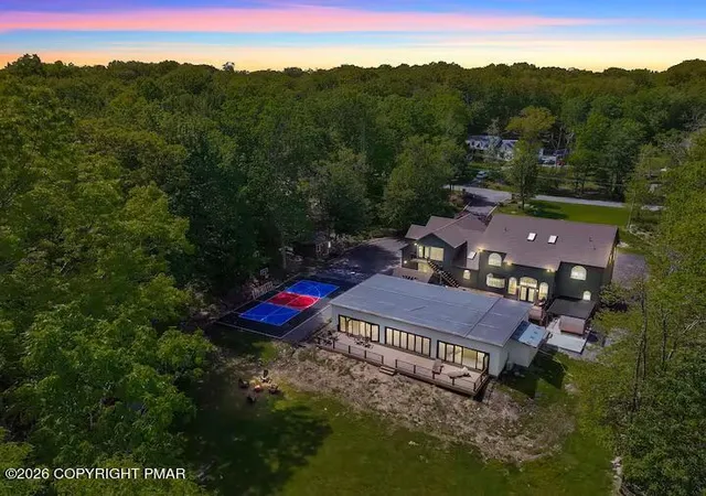 Photo 2 of Mansion for sale at 406 Iroquois Loop, Canadensis, PA 18325 | MLS# PM-144018 | Listing updated on 2026-10-01