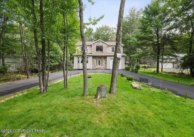 Photo 2 of Single family home for sale at 122 Tamarack Trl, Pocono Summit, PA 18346 | MLS# PM-144089 | Listing updated on 2026-08-21