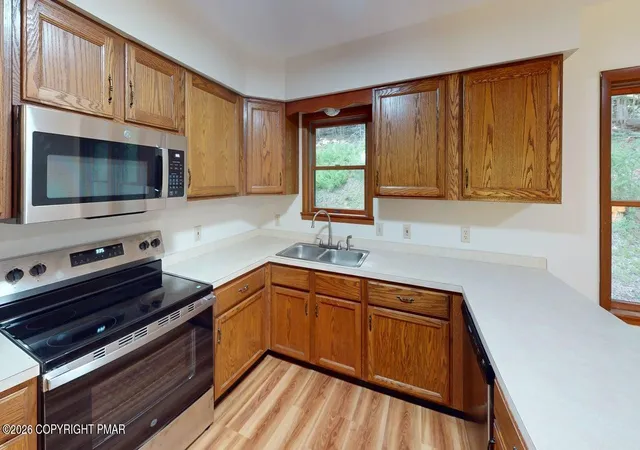 Photo 1 of Single family home for sale at 128 St Andrews Dr, Bushkill, PA 18324 | MLS# PM-144032 | Listing updated on 2026-09-04