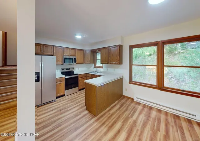 Photo 2 of Single family home for sale at 128 St Andrews Dr, Bushkill, PA 18324 | MLS# PM-144032 | Listing updated on 2026-09-04