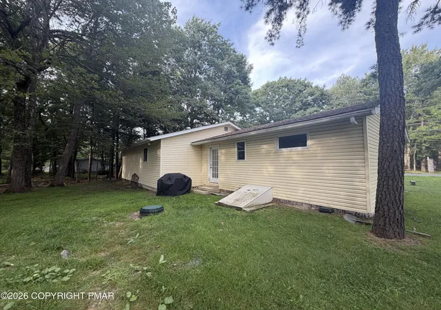 Photo 18 of Single family home for sale at 123 Stillwater Dr, Pocono Summit, PA 18346 | MLS# PM-144104 | Listing updated on 2026-09-05