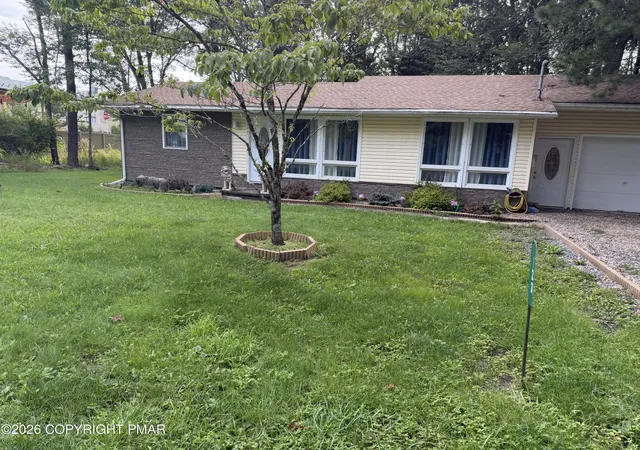 Photo 2 of Single family home for sale at 123 Stillwater Dr, Pocono Summit, PA 18346 | MLS# PM-144104 | Listing updated on 2026-09-05