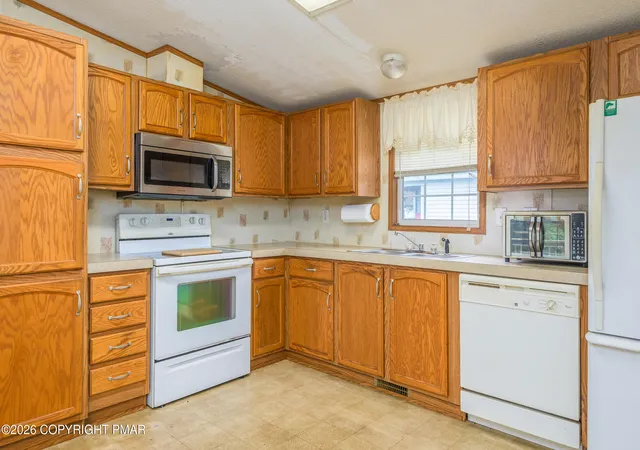 Photo 3 of Manufactured home for sale at 161 Buttonwood Ct, East Stroudsburg, PA 18301 | MLS# PM-144135 | Listing updated on 2026-09-15