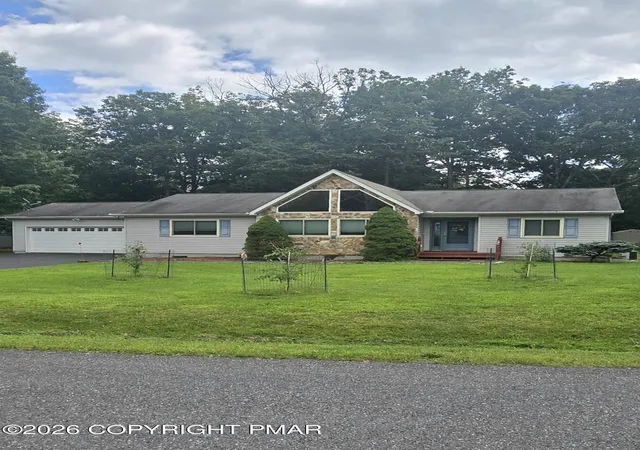 Photo 2 of Single family home for sale at 513 Gandolf Rd, Tamiment, PA 18371 | MLS# PM-144117 | Listing updated on 2026-08-26