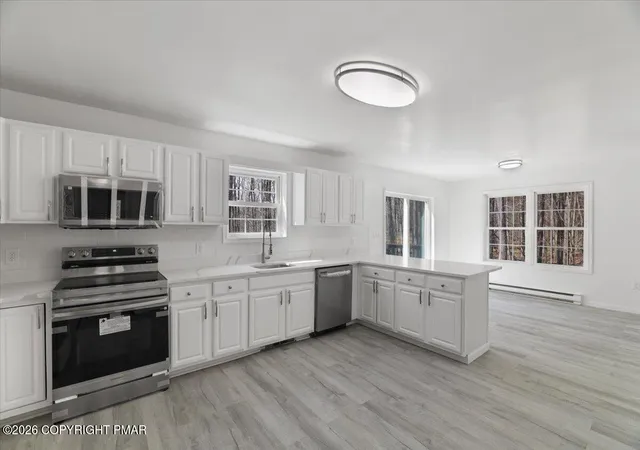 Photo 5 of Single family home for sale at 1111 Apollo Dr, Gouldsboro, PA 18424 | MLS# PM-144227 | Listing updated on 2026-09-03